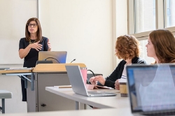 Dr. Jennifer Yost teaching a class of nursing students