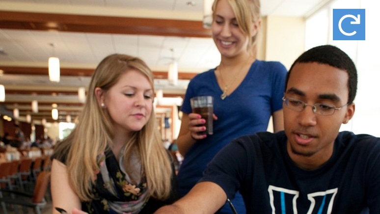 Students are having meal at the cafeteria.